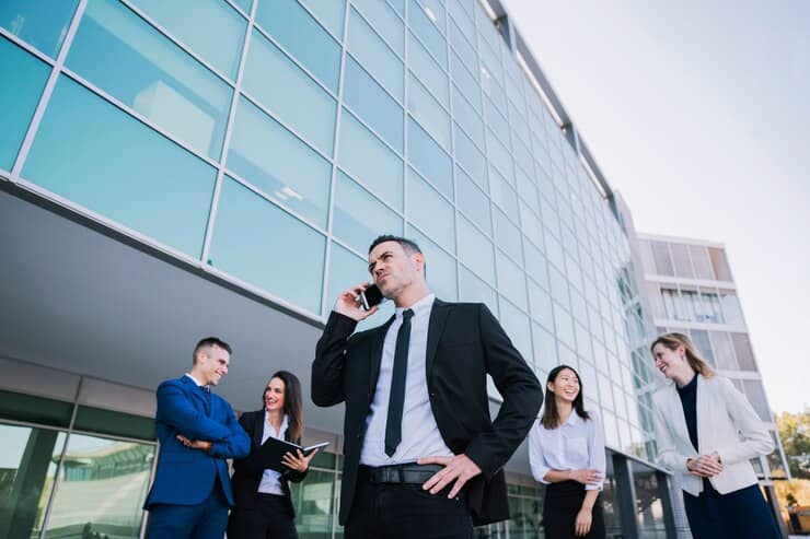 Business Team Standing Near the Office